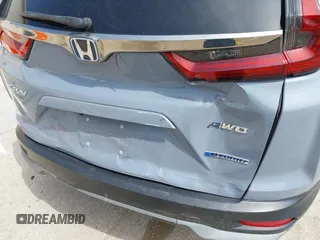 2020 Honda CR-V EX-L with VIN 7FART6H80LE011540, listed as a IAAI auction lot 42033698 with 70,834 mi miles and . Bid and sale history available at DreamBid. Image 6.