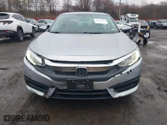 2016 Honda Civic EX with VIN 19XFC2F75GE217935, listed as a IAAI auction lot 41963307 with 87,477 mi miles and . Bid and sale history available at DreamBid. Image 12.