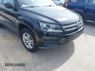 2012 Volkswagen Tiguan SE with VIN WVGAV7AXXCW526403, listed as a IAAI auction lot 41852974 with 125,376 mi miles and . Bid and sale history available at DreamBid. Image 6.