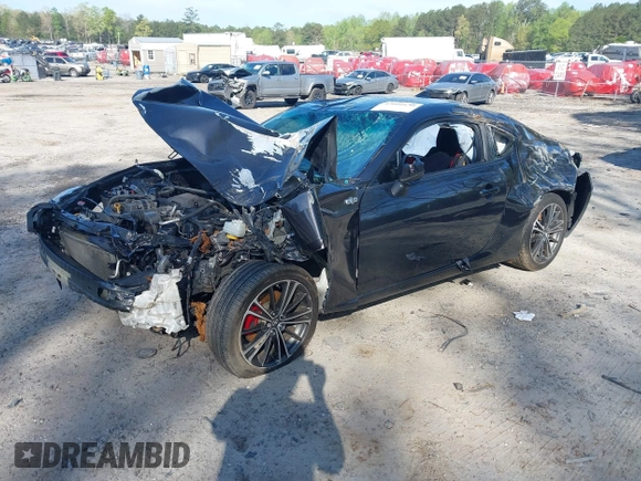 2015 Scion FR-S with VIN JF1ZNAA10F8707671, listed as a IAAI auction lot 42000130 with 136,734 mi miles. Bid and sale history available at carsss.com. Image 2.