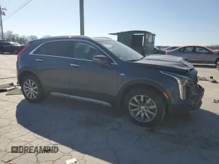 2021 Cadillac XT4 AWD Premium Luxury with VIN 1GYFZDR47MF002175, listed as a Copart auction lot 48303665 with 94,698 mi miles and Salvage Title. Bid and sale history available at carsss.com. Image 4.