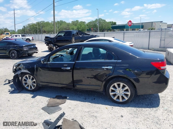 2011 Lincoln MKZ with VIN 3LNHL2GC9BR763431, listed as a IAAI auction lot 42037377 with 331,415 mi miles. Bid and sale history available at carsss.com. Image 14.