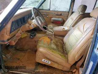 1986 Jeep Grand Wagoneer с VIN 1JCNJ15U5GT147524, выставлен на аукционе Copart как лот 57421255 с пробегом 112 292 миль миль и Списание • Salvage title. История ставок и продаж доступна на DreamBid. Изображение 7.