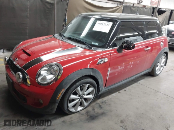 2013 MINI Hardtop S with VIN WMWSV3C50DT392160, listed as a IAAI auction lot 41893232 with 70,922 mi miles and . Bid and sale history available at DreamBid. Image 2.