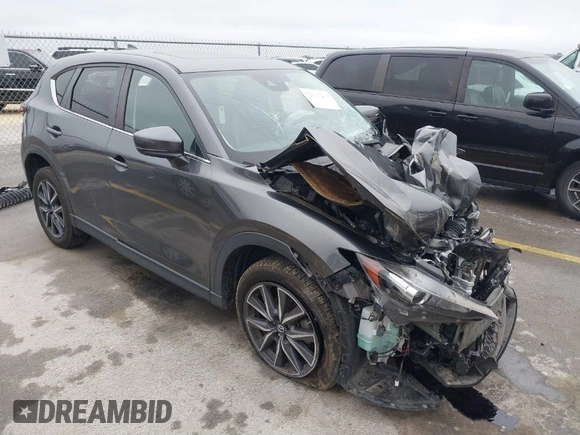 2018 Mazda CX-5 Touring with VIN JM3KFBCM0J0312958, listed as a IAAI auction lot 41565238 with 1 mi miles. Bid and sale history available at carsss.com. Image 1.