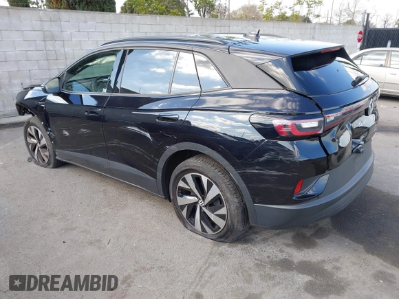 2023 Volkswagen ID.4 Pro z VIN 1V2DNPE85PC028748, wystawiony jako IAAI lot #41348983 z przebiegiem 7 434 mil mil oraz . Historia ofert i sprzedaży dostępna na DreamBid. Obrazek 3.