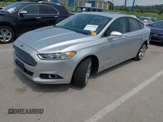 2013 Ford Fusion SE Hybrid с VIN 3FA6P0LU7DR267300, выставлен на аукционе IAAI как лот 42376940 с пробегом 148 298 миль миль и . История ставок и продаж доступна на DreamBid. Изображение 2.