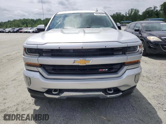 2016 Chevrolet Silverado 1500 LT with VIN 3GCUKREC8GG375823, listed as a Copart auction lot 55249625 with 113,232 mi miles and Salvage Title. Bid and sale history available at DreamBid. Image 5.