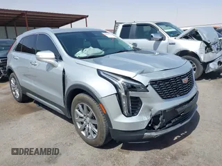 2021 Cadillac XT4 FWD Premium Luxury with VIN 1GYFZCR42MF005253, listed as a IAAI auction lot 40470700 with 70,571 mi miles and . Bid and sale history available at carsss.com. Image 1.