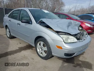 2007 Ford Focus S with VIN 1FAHP34N87W161778, listed as a IAAI auction lot 41823559 with 242,258 mi miles. Bid and sale history available at carsss.com. Image 1.