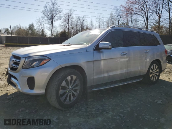 2019 Mercedes-Benz GLS 450 with VIN 4JGDF6EE8KB233053, listed as a Copart auction lot 49957755 with 68,676 mi miles and Salvage title. Bid and sale history available at DreamBid. Image 1.