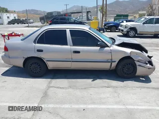 2000 Toyota Corolla VE with VIN 1NXBR12E5YZ369711, listed as a IAAI auction lot 42550174 with 273,785 mi miles and . Bid and sale history available at DreamBid. Image 14.