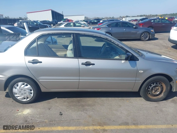 2003 Mitsubishi Lancer ES with VIN JA3AJ26E63U007501, listed as a IAAI auction lot 41771016 with 146,984 mi miles. Bid and sale history available at carsss.com. Image 13.