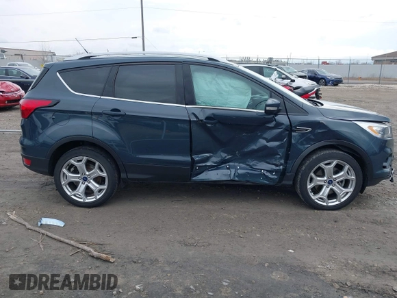 2019 Ford Escape Titanium with VIN 1FMCU9J95KUC28621, listed as a IAAI auction lot 41825297 with 60,373 mi miles. Bid and sale history available at carsss.com. Image 13.