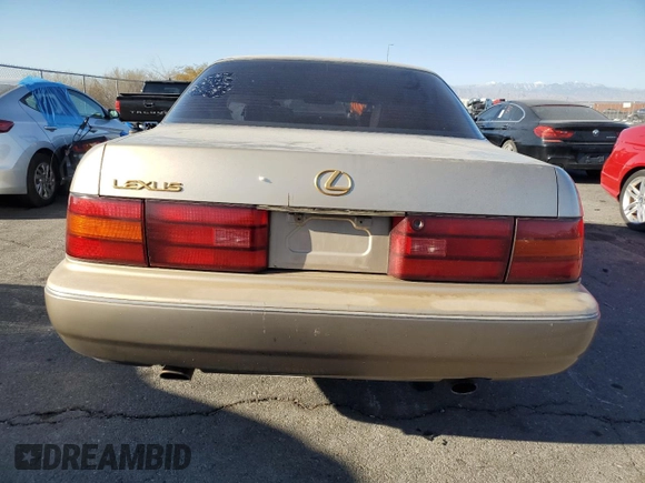 1994 Lexus LS z VIN JT8UF11E1R0205273, wystawiony jako Copart lot #43236585 z przebiegiem 130 052 mil mil oraz Szkoda całkowita • Salvage title. Historia ofert i sprzedaży dostępna na DreamBid. Obrazek 6.
