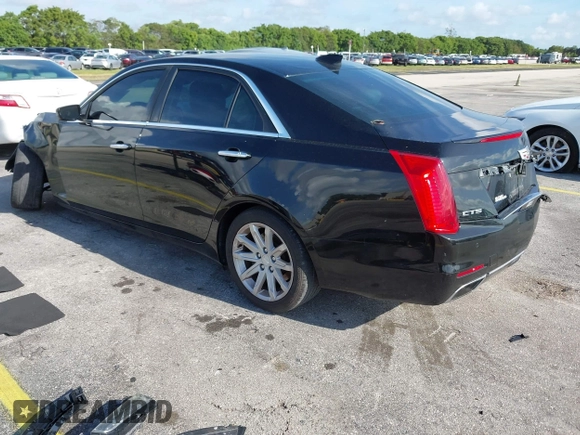 2015 Cadillac CTS RWD with VIN 1G6AP5SX8F0140364, listed as a IAAI auction lot 42535236 with 126,277 mi miles and . Bid and sale history available at DreamBid. Image 3.
