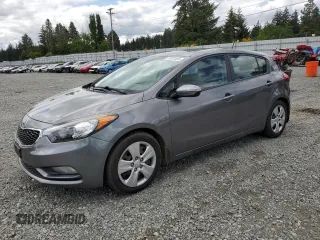 2016 Kia Forte LX z VIN KNAFK5A84G5634959, wystawiony jako Copart lot #57991535 z przebiegiem 111 650 mil mil oraz Czysty tytuł • Clean title. Historia ofert i sprzedaży dostępna na DreamBid. Obrazek 1.