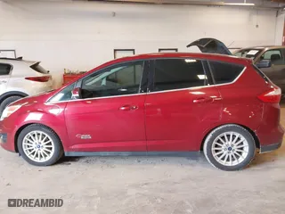 2015 Ford C-Max Energi SEL with VIN 1FADP5CU8FL101857, listed as a IAAI auction lot 41930615 with 148,579 mi miles. Bid and sale history available at carsss.com. Image 14.