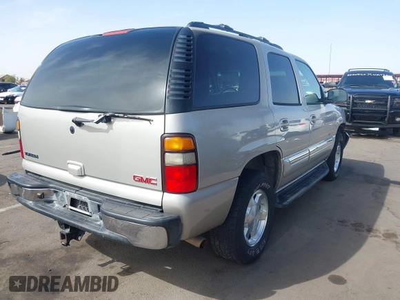 2004 GMC Yukon SLT with VIN 1GKEK13Z54R144181, listed as a IAAI auction lot 41702834 with 146,827 mi miles. Bid and sale history available at carsss.com. Image 4.