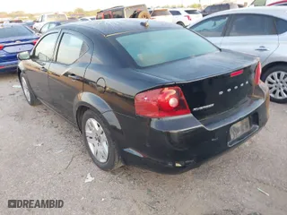 2014 Dodge Avenger SE with VIN 1C3CDZAB3EN148292, listed as a IAAI auction lot 42043642 with 134,676 mi miles. Bid and sale history available at carsss.com. Image 3.
