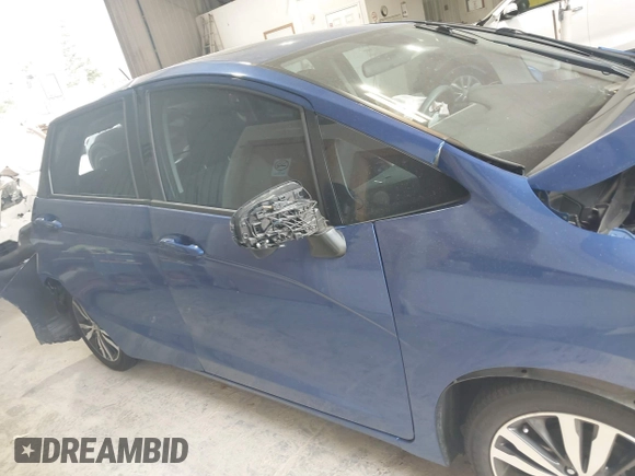2015 Honda Fit EX-L z VIN 3HGGK5H82FM754220, wystawiony jako IAAI lot #42570240 z przebiegiem Nie podano mil oraz . Historia ofert i sprzedaży dostępna na DreamBid. Obrazek 13.