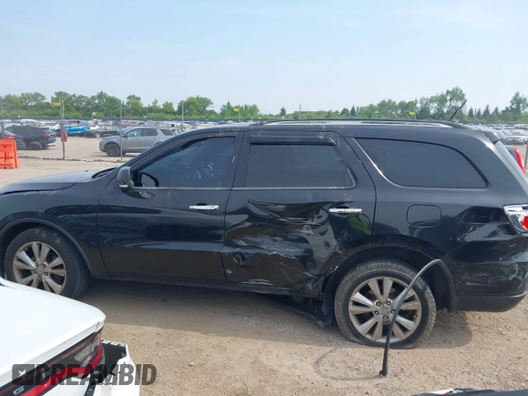 2013 Dodge Durango Crew z VIN 1C4RDJDG3DC685995, wystawiony jako IAAI lot #42490067 z przebiegiem 205 806 mil mil oraz . Historia ofert i sprzedaży dostępna na DreamBid. Obrazek 14.