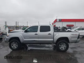 2014 Toyota Tacoma with VIN 3TMLU4EN2EM161239, listed as a IAAI auction lot 41536944 with 136,299 mi miles. Bid and sale history available at carsss.com. Image 14.