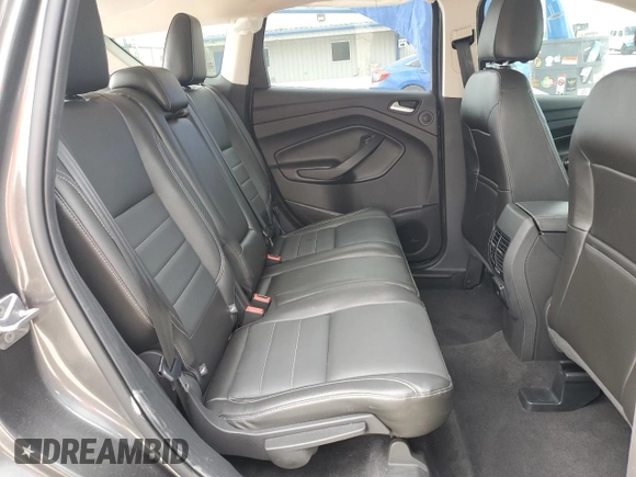 2016 Ford Escape Titanium with VIN 1FMCU9J91GUA47829, listed as a Copart auction lot 54051275 with 86,046 mi miles and Salvage Title. Bid and sale history available at DreamBid. Image 11.