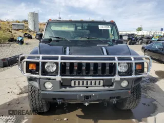 2006 Hummer H2 with VIN 5GRGN23U36H101486, listed as a Copart auction lot 74577884 with 146,203 mi miles and Salvage Title. Bid and sale history available at carsss.com. Image 5.