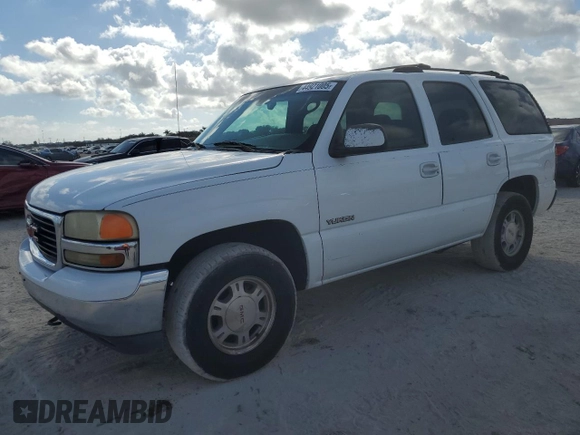2002 GMC Yukon SLT with VIN 1GKEC13V12R196673, listed as a Copart auction lot 44921005 with 217,403 mi miles and Salvage Title. Bid and sale history available at carsss.com. Image 1.