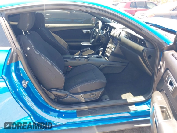 2021 Ford Mustang EcoBoost with VIN 1FA6P8TH0M5119073, listed as a IAAI auction lot 42225499 with 52,165 mi miles and . Bid and sale history available at DreamBid. Image 5.