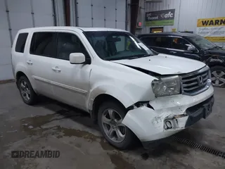 2015 Honda Pilot EX-L with VIN 5FNYF4H59FB023814, listed as a IAAI auction lot 41161235 with 216,437 mi miles and . Bid and sale history available at carsss.com. Image 1.