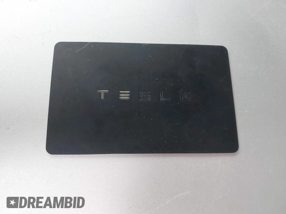 2019 Tesla Model 3 Mid Range with VIN 5YJ3E1EA8KF436086, listed as a IAAI auction lot 41682093 with 70,332 mi miles and . Bid and sale history available at DreamBid. Image 11.