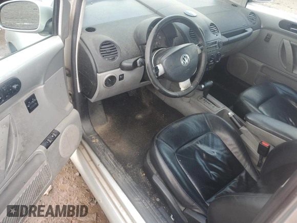 2001 Volkswagen Beetle GLX with VIN 3VWDD21C21M406898, listed as a Copart auction lot 55597675 with 104,597 mi miles and Salvage Title. Bid and sale history available at DreamBid. Image 8.