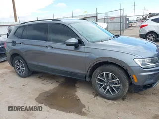 2021 Volkswagen Tiguan S with VIN 3VV0B7AX0MM017433, listed as a IAAI auction lot 42017125 with 54,624 mi miles and . Bid and sale history available at DreamBid. Image 6.