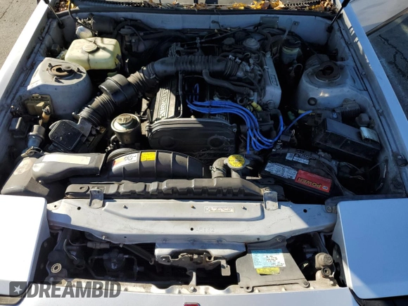 1986 Toyota Supra z VIN JT2MA67L9G0175108, wystawiony jako Copart lot #80793984 z przebiegiem 158 959 mil mil oraz Szkoda całkowita • Salvage title. Historia ofert i sprzedaży dostępna na DreamBid. Obrazek 11.