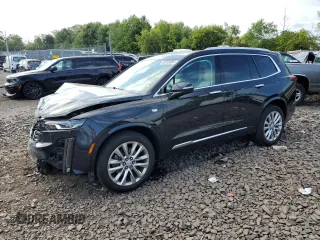 2020 Cadillac XT6 AWD Premium Luxury z VIN 1GYKPDRS4LZ103481, wystawiony jako Copart lot #69148554 z przebiegiem 69 407 mil mil oraz Szkoda całkowita • Salvage title. Historia ofert i sprzedaży dostępna na DreamBid. Obrazek 1.