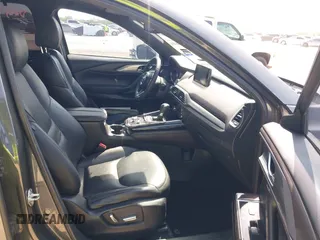 2016 Mazda CX-9 Grand Touring with VIN JM3TCADY5G0120033, listed as a IAAI auction lot 42248488 with 150,044 mi miles and . Bid and sale history available at DreamBid. Image 5.