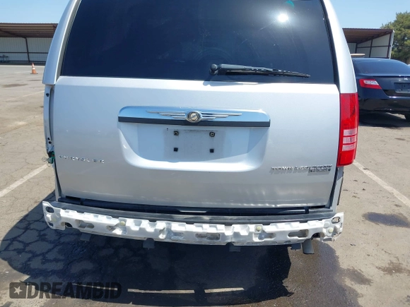 2010 Chrysler Town & Country Touring with VIN 2A4RR5D11AR346489, listed as a IAAI auction lot 42102358 with 150,860 mi miles. Bid and sale history available at carsss.com. Image 6.