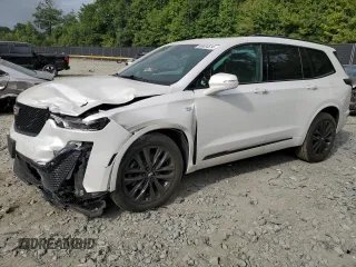 2021 Cadillac XT6 Sport z VIN 1GYKPGRS1MZ146145, wystawiony jako Copart lot #65934514 z przebiegiem 31 213 mil mil oraz Szkoda całkowita • Salvage title. Historia ofert i sprzedaży dostępna na DreamBid. Obrazek 1.