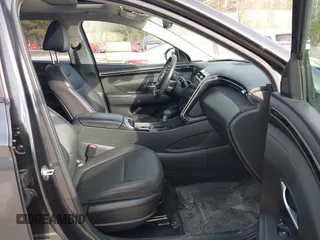 2023 Hyundai Tucson SEL with VIN 5NMJFCAE0PH281533, listed as a IAAI auction lot 41738468 with 36,881 mi miles and . Bid and sale history available at DreamBid. Image 5.