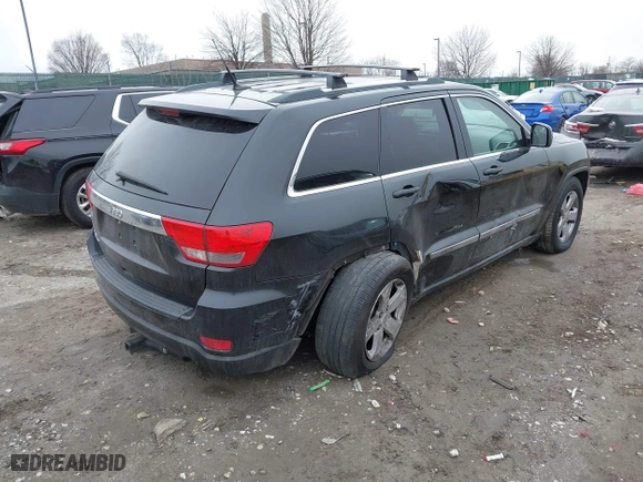 2011 Jeep Grand Cherokee Laredo with VIN 1J4RR4GGXBC511475, listed as a IAAI auction lot 41554620 with 164,361 mi miles. Bid and sale history available at carsss.com. Image 4.