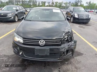 2015 Volkswagen Eos Komfort with VIN WVWBW8AH5FV004034, listed as a IAAI auction lot 41981978 with 106,450 mi miles and . Bid and sale history available at DreamBid. Image 12.