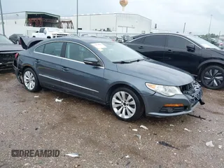 2009 Volkswagen CC Sport with VIN WVWML73C79E553395, listed as a IAAI auction lot 42078061 with 167,110 mi miles. Bid and sale history available at carsss.com. Image 1.