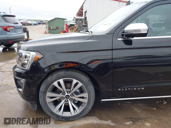 2019 Ford Expedition Platinum with VIN 1FMJU1MT8KEA02325, listed as a IAAI auction lot 41861772 with 77,124 mi miles. Bid and sale history available at carsss.com. Image 20.