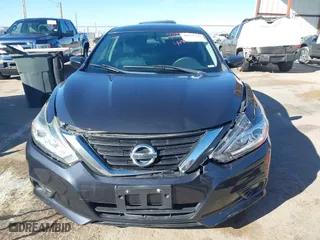 2017 Nissan Altima 2.5 SV with VIN 1N4AL3AP0HC277398, listed as a IAAI auction lot 40918944 with 214,412 mi miles. Bid and sale history available at carsss.com. Image 13.