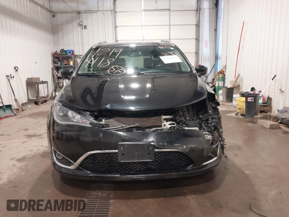 2020 Chrysler Pacifica Touring L with VIN 2C4RC1BG9LR140072, listed as a IAAI auction lot 42199118 with 93,557 mi miles and . Bid and sale history available at DreamBid. Image 13.