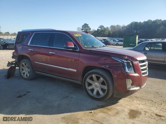 2020 Cadillac Escalade Premium Luxury with VIN 1GYS4CKJ7LR102961, listed as a Copart auction lot 48673875 with 142,808 mi miles and Salvage Title. Bid and sale history available at carsss.com. Image 4.