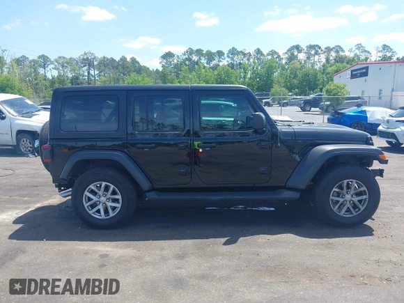 2023 Jeep Wrangler Sport S with VIN 1C4HJXDN5PW671167, listed as a IAAI auction lot 42176127 with 1,230 mi miles and . Bid and sale history available at DreamBid. Image 14.
