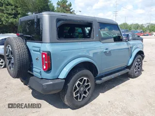 2022 Ford Bronco with VIN 1FMDE5AH3NLA89231, listed as a IAAI auction lot 42399132 with 13,244 mi miles and . Bid and sale history available at DreamBid. Image 4.
